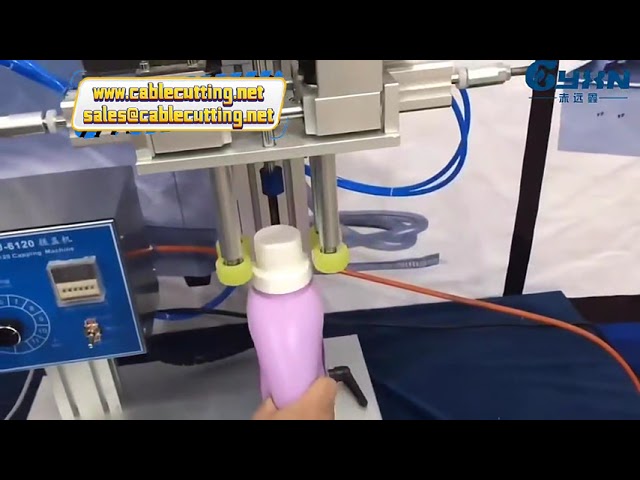 آلة غلق وربط أغطية زجاجات العطور الزجاجية والبلاستيكية - تعمل بالهواء المضغوط